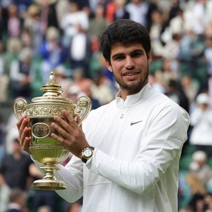 16th July 2023; All England Lawn Tennis and Croquet Club, London, England: Wimbledon Tennis Tournament; Mens singles final on centre court Novak Djokovic versus Carlos Alcaraz; Carlos Alcaraz lifts the winners trophy after beating Djokovic in a 5 set thriller  ActionPlus12532140 JohnxPatrickxFletcher