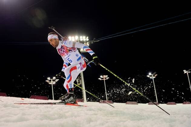 Winter Olympics - Martin Fourcade Wins Gold Medal - Sochi Martin Fourcade of France celebrates after winning the Men s 12.5 km Pursuit in Laura Cross-country Ski & Biathlon Center at the Sochi 2014 Olympic Games, Olympische Spiele, Olympia, OS Krasnaya Polyana, Russia, 10 February 2014. Photo by Gouhier-Zabulon ABACAPRESS.COM Sochi Russia  Copyright: xGouhier-Zabulon ABACAx 433279_015 Gouhier-Zabulon ABACAx 433279_015