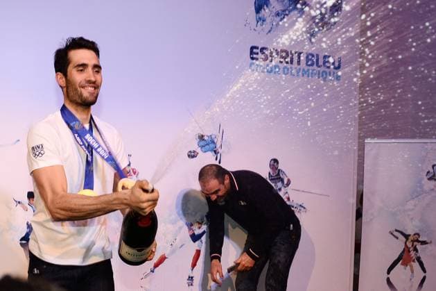 Winter Olympics - Martin Fourcade Celebrates At Club France - Sochi Gold medalist Martin Fourcade of France, along with his coach Stephane Bouthiaux, celebrates at Club France after he won gold in the Men s Individual 20km during the Sochi 2014 Winter Olympics on February 14, 2014 in Sochi, Russia. Photo Gouhier-Zabulon ABACAPRESS.COM Sochi Russia  Copyright: xGouhier-Zabulon ABACAx 434046_001 Gouhier-Zabulon ABACAx 434046_001