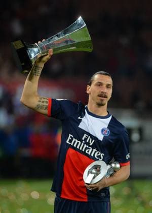 PSG vs Montpellier Soccer Match - Paris Paris Swedish forward Zlatan Ibrahimovic (L) and Paris French goalkeeper Nicolas Douchez hold trophies as they celebrate after winning the French L1 title at the end of the French L1 football match Paris Saint-Germain (PSG) vs Montpellier Herault SC on May 17, 2014 at the Parc des Princes stadium in Paris. Paris Saint-Germain won the French Ligue 1 Championship title on Saturday, the 4th in the club s history.photo by Christian Liewig ABACAPRESS.COM Paris France  Copyright: xLiewigxChristian ABACAx 448013_091 LiewigxChristian ABACAx 448013_091
