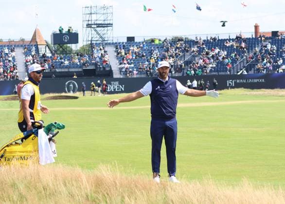 American Dustin Johnson stands on the 18th fairway after hooking his drive on the first day at the 151st Open Championship at Royal Liverpool Golf Club in Hoylake, England on Thursday, July 20, 2023.  LON2023072033 HUGOxPHILPOTT