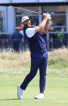 American Dustin Johnson plays a fairway iron on the first day at the 151st Open Championship at Royal Liverpool Golf Club in Hoylake, England on Thursday, July 20, 2023.  LON2023072039 HUGOxPHILPOTT