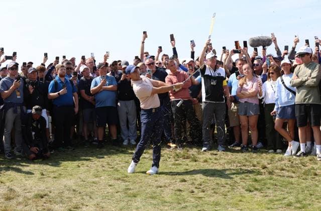 Northern Ireland s Rory Mcllroy hits out of the rough on the second hole on the first day at the 151st Open Championship at Royal Liverpool Golf Club in Hoylake, England on Thursday, July 20, 2023.  LON20230720107 HUGOxPHILPOTT
