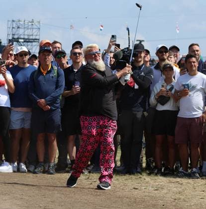American John Daly hits out of the rough on the 1st fairway on the first day at the 151st Open Championship at Royal Liverpool Golf Club in Hoylake, England on Thursday, July 20, 2023.  LON2023072054 HUGOxPHILPOTT