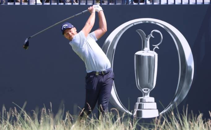 England s Danny Gillett tees off on the 1st on the first day at the 151st Open Championship at Royal Liverpool Golf Club in Hoylake, England on Thursday, July 20, 2023.  LON2023072050 HUGOxPHILPOTT