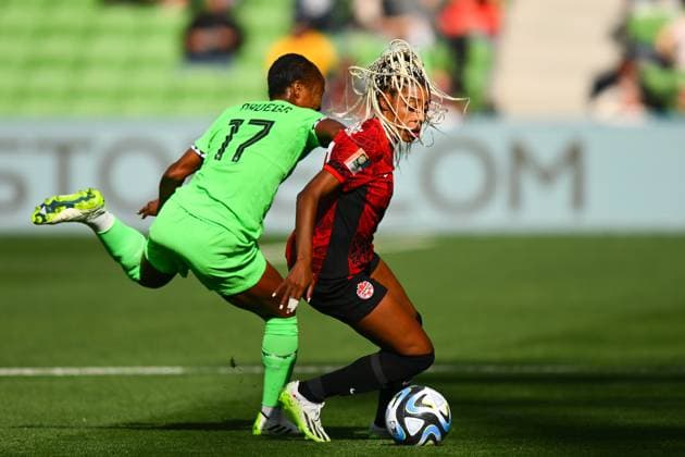 WWC23 CANADA NIGERIA, Ashley Lawrence of Canada (right) is tackled by Francisca Ordega of Nigeria during the FIFA Women s World Cup 2023 soccer match between Nigeria and Canada at Melbourne Rectangular Stadium in Melbourne, Friday, July 21, 2023. ( NO ARCHIVING, EDITORIAL USE ONLY, NO USE IN BOOKS WITHOUT CONSENT MELBOURNE VICTORIA AUSTRALIA  Copyright: xMORGANxHANCOCKx 20230721001822520324 