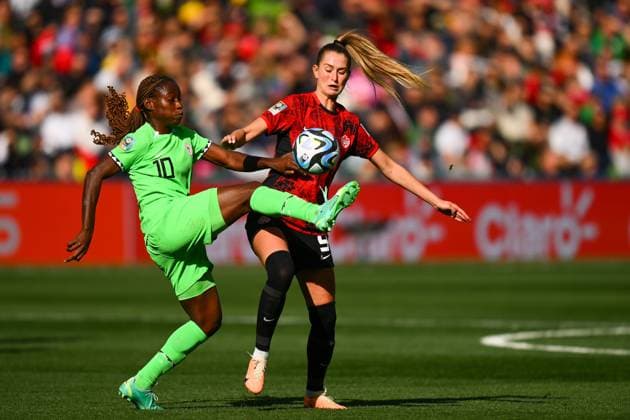 WWC23 CANADA NIGERIA, Jordyn Huitema of Canada (right) fights for the ball with Christy Ucheibe of Nigeria during the FIFA Women s World Cup 2023 soccer match between Nigeria and Canada at Melbourne Rectangular Stadium in Melbourne, Friday, July 21, 2023. ( NO ARCHIVING, EDITORIAL USE ONLY, NO USE IN BOOKS WITHOUT CONSENT MELBOURNE VICTORIA AUSTRALIA  Copyright: xMORGANxHANCOCKx 20230721001822523089 
