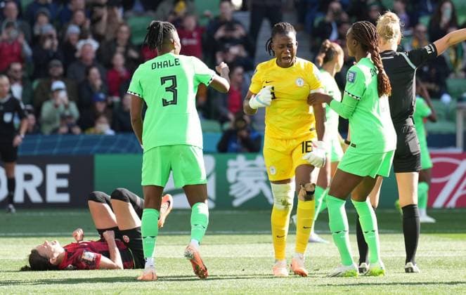 July 21, 2023, Melbourne, MB, Australia: Canada s Christine Sinclair reacts on the ground after missing a penalty kick as Nigeria goalkeeper Chiamaka Nnadozie, centre, celebrates with teammates during second half Group B soccer action at the FIFA Women s World Cup in Melbourne, Australia, Friday, July 21, 2023. Canada News - July 21, 2023  - ZUMAc35_ 20230721_zaf_c35_012 Copyright: xScottxBarbourx