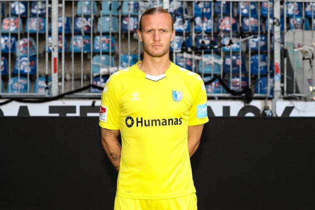 Torwart Dominik Reimann (1. FC Magdeburg,1) - 2. Fussball Bundesliga Portraittermin 2023 2024 offizieller Fototermin 1. FC Magdeburg in der MDCC Arena in Magdeburg - Porträt, Portrait,Einzelbild,Deutschland, Fussball, Maenner,GER,20.07.2023