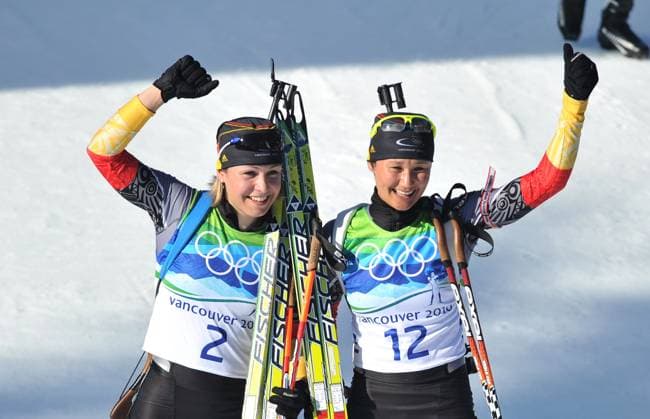 Olympic Winter games, Winterspiele,Spiele, Summer games - Biathlon Women s 12,5 km Mass Start - Whistler Germany s Magdalena Neuner and Germany s Simone Hauswald celebrates after their First and thirth place after the Biathlon Women s 12,5 km Mass Start for the Vancouver 2010 XXI Olympic Winter Games at Olympic Park in Whistler, Canada on February 21, 2010. Photo by Gouhier-Hahn-Nebinger ABACAPRESS.COM Whistler BC Canada  Copyright: xGouhier-Hahn-Nebinger ABACAx 220856_027 Gouhier-Hahn-Nebinger ABACAx 220856_027