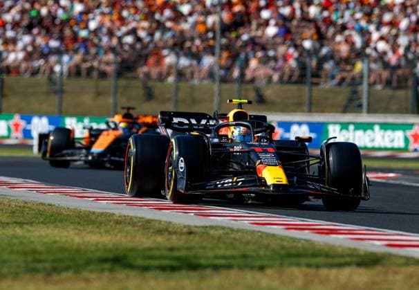 11 PEREZ Sergio (mex), Red Bull Racing RB19, action during the 2023 Formula 1 Qatar Airways Hungarian Grand Prix, 11th round of the 2023 Formula One World Championship, WM, Weltmeisterschaft from July 21 to 23, 2023 on the Hungaroring, in Mogyorod, Hungary - F1 - HUNGARIAN GRAND PRIX 2023 DPPI Panoramic  00123026_F12023GP12HUN_JK110586 