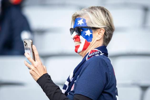 July 23, 2023, Auckland, Auckland, New Zealand: A United States fan has their face painted with the United States flag and take a picture before the start of the 2023 FIFA Womens World Cup Group E match against Vietnam at the Eden Park Stadium in Auckland, New Zealand, The United States won the match with a score of 3 - 0. Auckland New Zealand - ZUMAb240 20230723_zsp_b240_004 Copyright: xIraxL.xBlackx