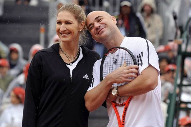 Tennis File Pictures German former tennis player Steffi Graff poses with her husband, US former tennis player Andre Agassi pose after playing an exhibition match on the sideline of the French Open at Roland Garros stadium in Paris, France on June 6, 2009. The event, the second Grand Slam tournament of 2009, runs from May 24 to June 7, 2009. Photo by Corinne Dubreuil Cameleon ABACAPRESS.COM Paris - France  Copyright: xDubreuilxCorinne ABACAx 190454_015 DubreuilxCorinne ABACAx 190454_015