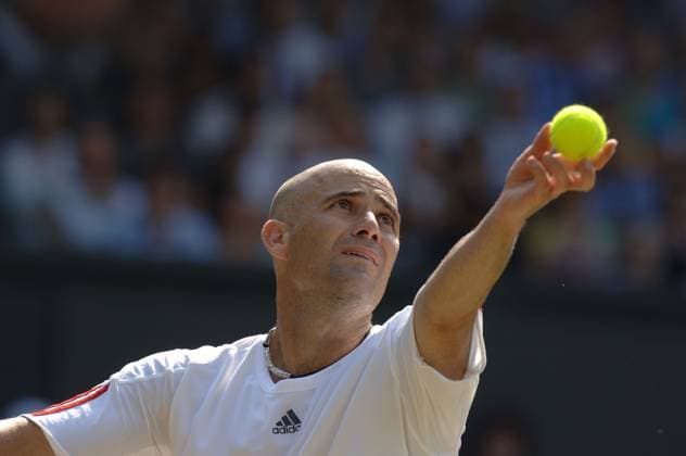 WImbledon tournament- Andre Agassi vs Rafael Nadal Spanish Rafael Nadal defeats 7-6, 6-2, 6-4 American Andre Agassi in their third round match of the All England Lawn Tennis Championships at Wimbledon in London, UK on July 1, 2006. Photo by Corinne Dubreuil Cameleon ABACAPRESS.COM London  Copyright: xDubreuilxCorinne ABACAx 101165_23 DubreuilxCorinne ABACAx 101165_23