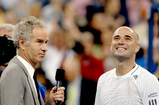 US Open second round in Flushing Meadows, New-York USA s Andre Agassi pictured with John McEnroe after he defeated Marcos Baghdatis at the 2006 US Open in New York City, NY, USA, on August 31, 2006. Photo by Corinne Dubreuil Cameleon ABACAPRESS.COM New York City NY  Copyright: xDubreuilxCorinne ABACAx 104529_02 DubreuilxCorinne ABACAx 104529_02