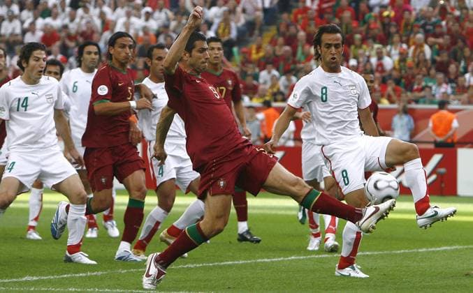 World Cup 2006-Group D Portugal vs Iran Portugal s Pauleta and Iran s Ali Karimi battle for the ball during the World Cup 2006, Portugal vs Iran at the FIFA World Cup, WM, Weltmeisterschaft, Fussball Stadium in Frankfurt, Germany on June 17, 2006. Portugal won 2-0. Photo by Christian Liewig ABACAPRESS.COM Frankfurt Germany  Copyright: xLiewigxChristian ABACAx 100182_18 LiewigxChristian ABACAx 100182_18