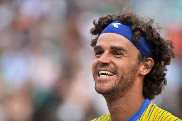 French Open defeat sends tennis player Kuerten into retirement Former world No.1 Brazil s Gustavo Kuerten retired from tennis after losing 6-3, 6-4, 6-2 to France s Paul-Henri Mathieu in an emotional first round tie at the Roland Garros stadium in Paris, France on May 25, 2008. Photo by Corinne Dubreuil Cameleon ABACAPRESS.COM Paris - France  Copyright: xDubreuilxCorinne ABACAx 153478_37 DubreuilxCorinne ABACAx 153478_37