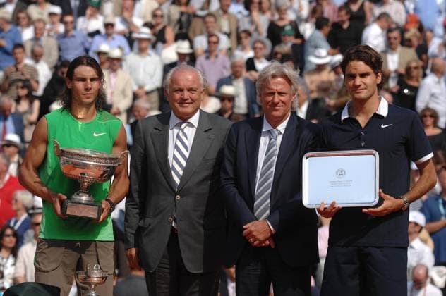 Rafael Nadal defeats Roger Federer in their Final of the French Tennis Open in Roland Garros Spain s Rafael Nadal and Switzerland s Roger Federer, along with Christian Bimes and Bjorn Borg, hold their trophy after their Final during the French Tennis Open at Roland Garros in Paris France on June 8, 2008. Nadal won 6-1, 6-3, 6-0. Photo by Corinne Dubreuil Cameleon ABACAPRESS.COM Paris - France  Copyright: xDubreuilxCorinne ABACAx 154674_36 DubreuilxCorinne ABACAx 154674_36