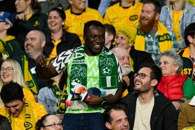 27th July 2023; Brisbane Stadium, Brisbane, Queensland, Australia: FIFA Womens World Cup Group B Football, Australia versus Nigeria; a Nigerian fan celebrates amongst Australian fans as his team takes the lead  ActionPlus12535972 NigelxOwen