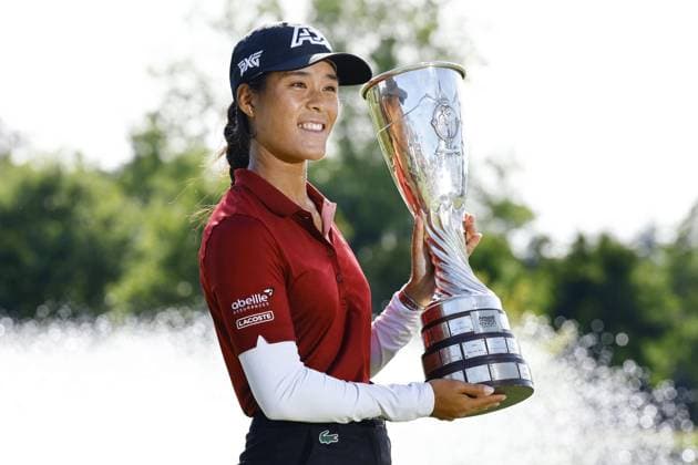 Golf: Evian Championship Celine Boutier of France celebrates with the victor s trophy after winning the Evian Championship golf tournament at Evian Resort Golf Club in Evian-les-Bains, France, on July 30, 2023.  A14AA0001727987P  