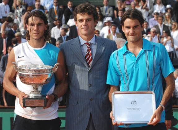 Rafael Nadal Wins the French Open - Paris Spain s Rafael Nadal (L) with his Philippe Chatrier Trophy and Switzerland s Roger Federer (R) pose with former winner Gustavo Kuerten (C) after the Men s Singles Final at the Roland Garros stadium in Paris, France, on June 10, 2007. Nadal won 6-3, 4-6, 6-3, 6-4. Photo by Gorassini-Gouhier-Guibbaud-Guignebourg Cameleon ABACAPRESS.COM Paris France  Copyright: xGorassini-Gouhier-Guignebourg-Guibbaud ABACAx 124465_36 Gorassini-Gouhier-Guignebourg-Guibbaud ABACAx 124465_36