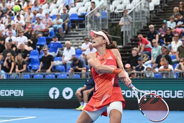 Alize Cornet of France returns a ball to Tamara Korpatsch of Germany during their match at the WTA, Tennis Damen Prague Open 2023 tennis tournament, quarterfinal, on August 4, 2023, in Prague, Czech Republic. (CTKxPhoto MichalxKamaryt) CTKPhotoP2023080405626  CTKPhotoP2023080405626
