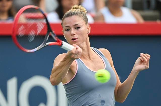 August 5, 2023, Montreal, PQ, Canada: Camila Giorgi, of Italy, plays a shot to Elvina Kalieva, from the United States, during their qualifying match at the National Bank Open tennis tournament in Montreal, Saturday, August 5, 2023. Camila Giorgi, Elvina Kalieva,  - ZUMAc35_ 20230805_zaf_c35_036 Copyright: xGrahamxHughesx