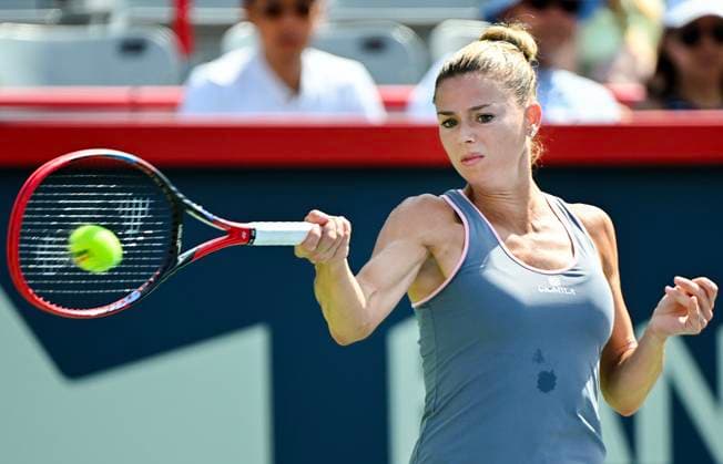 August 5, 2023, Montreal, PQ, Canada: Camila Giorgi, of Italy, plays a shot to Elvina Kalieva, from the United States, during their qualifying match at the National Bank Open tennis tournament in Montreal, Saturday, August 5, 2023. Camila Giorgi, Elvina Kalieva,  - ZUMAc35_ 20230805_zaf_c35_037 Copyright: xGrahamxHughesx