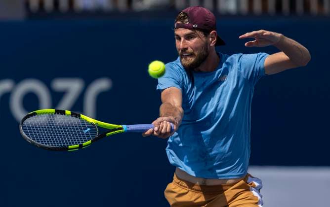 (230806) -- TORONTO, Aug. 6, 2023 -- Maxime Cressy of the United States returns the ball during the first round of men s qualifying singles match against Brayden Schnur of Canada at the 2023 National Bank Open in Toronto, Canada, on Aug. 5, 2023. (Photo by Xinhua) (SP)CANADA-TORONTO-TENNIS-NATIONAL BANK OPEN-MEN S SINGLES-QUALIFICATIONS ZouxZheng 