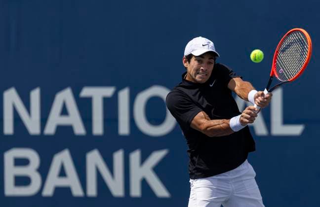 (230806) -- TORONTO, Aug. 6, 2023 -- Cristian Garin of Chile returns the ball during the first round of men s qualifying singles match against Maxime Janvier of France at the 2023 National Bank Open in Toronto, Canada, on Aug. 5, 2023. (Photo by Xinhua) (SP)CANADA-TORONTO-TENNIS-NATIONAL BANK OPEN-MEN S SINGLES-QUALIFICATIONS ZouxZheng 