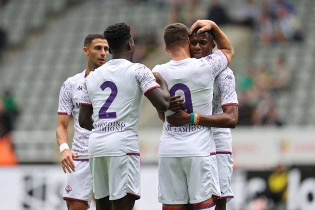 NEWCASTLE UPON TYNE, ENGLAND AUGUST 06: Luka Jovic (2nd L) is celebrated by his team mates after scoring the first goal for ACF Fiorentina during the Sela Cup soccer match between ACF Fiorentina and OGC Nice at St. James Park on August 06, 2023 in Newcastle upon Tyne, England. Sela Cup soccer tournament SELA_2023