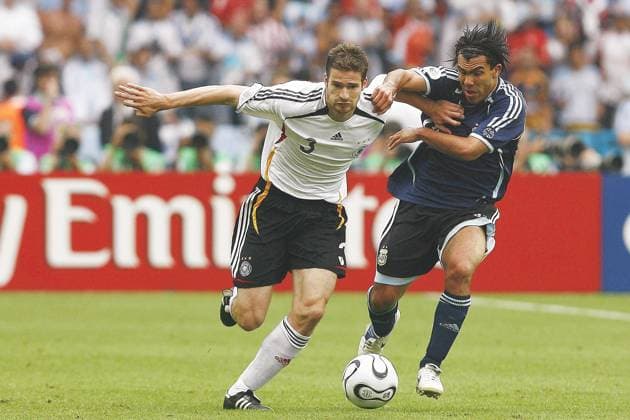 World Cup 2006-Quarter final, Germany vs Argentina Argentina s Carlos Tevez and Germany s Arne Friedrich battle for the ball during the FIFA World Cup, WM, Weltmeisterschaft, Fussball 2006, quarter final, Germany vs Argentina, in Berlin, Germany, on June 30, 2006. The game ended in draw 1-1 and Germany won (4-2) in a penalty-kick shootout. Photo by Christian Liewig ABACAPRESS.COM Berlin Germany  Copyright: xLiewigxChristian ABACAx 101125_12 LiewigxChristian ABACAx 101125_12