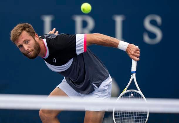 (230807) -- TORONTO, Aug. 7, 2023 -- Corentin Moutet of France returns the ball against Taro Daniel of Japan during the second round of men s qualifying singles match at the 2023 National Bank Open in Toronto, Canada, on Aug. 6, 2023. (Photo by Xinhua) (SP)CANADA-TORONTO-TENNIS-NATIONAL BANK OPEN-MEN S SINGLES-QUALIFICATIONS ZouxZheng 
