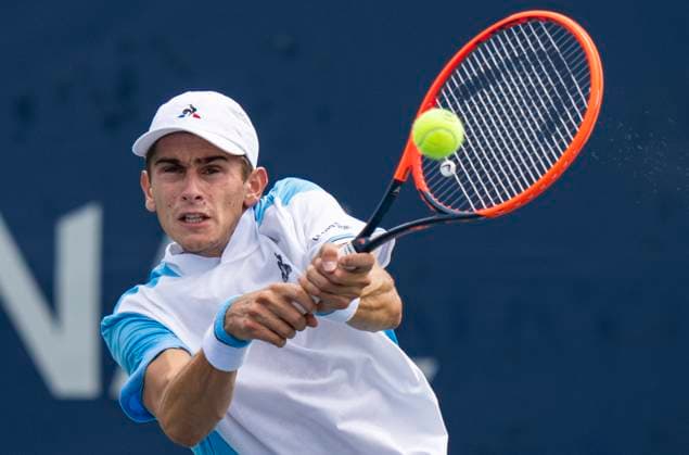 (230807) -- TORONTO, Aug. 7, 2023 -- Matteo Arnaldi of Italy returns the ball against Matija Pecotic of Croatia during the second round of men s qualifying singles match at the 2023 National Bank Open in Toronto, Canada, on Aug. 6, 2023. (Photo by Xinhua) (SP)CANADA-TORONTO-TENNIS-NATIONAL BANK OPEN-MEN S SINGLES-QUALIFICATIONS ZouxZheng 