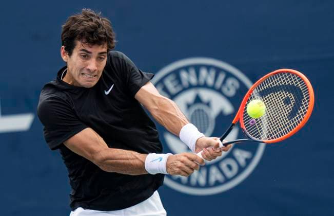 (230807) -- TORONTO, Aug. 7, 2023 -- Cristian Garin of Chile returns the ball against Christopher O Connell of Australia during the second round of men s qualifying singles match at the 2023 National Bank Open in Toronto, Canada, on Aug. 6, 2023. (Photo by Xinhua) (SP)CANADA-TORONTO-TENNIS-NATIONAL BANK OPEN-MEN S SINGLES-QUALIFICATIONS ZouxZheng 