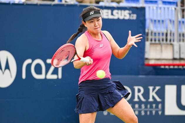 MONTREAL, QC - AUGUST 07: Lin Zhu (CHN) retruns the ball during a first round match at WTA, Tennis Damen National Bank Open on August 07, 2023 at IGA Stadium in Montreal, QC (Photo by David Kirouac Icon Sportswire) TENNIS: AUG 07 National Bank Open EDITORIAL USE ONLY Icon230807007