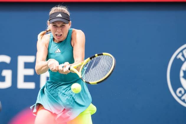 August 08, 2023: Caroline Wozniacki (DEN) returns the ball during the WTA, Tennis Damen National Bank Open first round match at IGA Stadium in Montreal, Quebec. CSM Montreal Canada - ZUMAc04_ 20230808_zma_c04_095 Copyright: xDanielxLeax