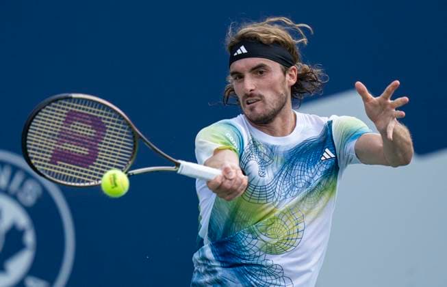 (230810) -- TORONTO, Aug. 10, 2023 -- Stefanos Tsitsipas competes during the men s singles round of 32 match between Stefanos Tsitsipas of Greece and Gael Monfils of France at the National Bank Open tennis tournament in Toronto, Canada, on Aug. 9, 2023. ) (SP)CANADA-TORONTO-TENNIS-NATIONAL BANK OPEN-MEN S SINGLES ZouxZheng 