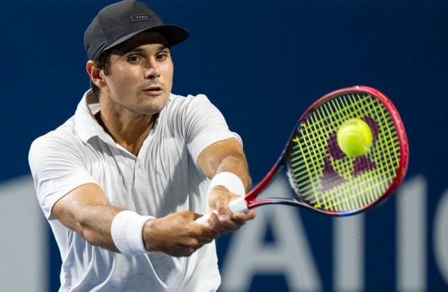 (230810) -- TORONTO, Aug. 10, 2023 -- Marcos Giron of the United States competes during the men s singles round of 32 match between Marcos Giron of the United States and Holger Rune of Denmark at the National Bank Open tennis tournament in Toronto, Canada, on Aug. 9, 2023. (Photo by Xinhua) (SP)CANADA-TORONTO-TENNIS-NATIONAL BANK OPEN-MEN S SINGLES ZouxZheng 
