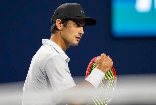 (230810) -- TORONTO, Aug. 10, 2023 -- Marcos Giron of the United States reacts during the men s singles round of 32 match between Marcos Giron of the United States and Holger Rune of Denmark at the National Bank Open tennis tournament in Toronto, Canada, on Aug. 9, 2023. (Photo by Xinhua) (SP)CANADA-TORONTO-TENNIS-NATIONAL BANK OPEN-MEN S SINGLES ZouxZheng 