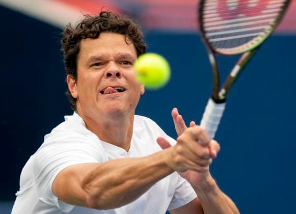 August 10, 2023, TORONTO, ON, Canada: Milos Raonic of Canada hits a return to Mackenzie McDonald of the United States in tennis action at the National Bank Open in Toronto, Thursday, Aug. 10, 2023. Canada News - August 10, 2023  - ZUMAc35_ 20230810_zaf_c35_040 Copyright: xFrankxGunnx