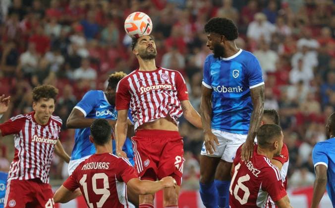 Olympiacos Ayoub El Kaabi and Genk s Mark McKenzie fight for the ball during a soccer game between Greek Olympiacos F.C. and Belgian KRC Genk, Thursday 10 August 2023 in Piraeus, Greece, the first leg of the third qualifying round for the UEFA Europa League competition. VIRGINIExLEFOUR  x71874153x
