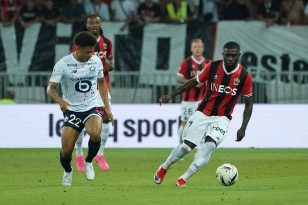 JÃ rÃ mie Boga (OGC Nice) - Santos Tiago Carvalho (Lille) FOOTBALL : OGC Nice vs Lille - Ligue 1 Uber Eats - Nice - 11 08 2023 NorbertScanella Panoramic 
