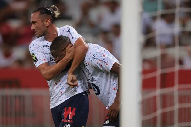Nice, France, 11th August 2023. Bafode Diakite of LOSC Lille celebrates with team mate Yusuf Yazici after scoring a late goal to level the game at 1-1 during the Ligue 1 match at Allianz Riviera Stadium, Nice. Picture credit should read: Jonathan Moscrop Sportimage EDITORIAL USE ONLY. No use with unauthorised audio, video, data, fixture lists, club league logos or live services. Online in-match use limited to 120 images, no video emulation. No use in betting, games or single club league player publications. SPI-2504-0010