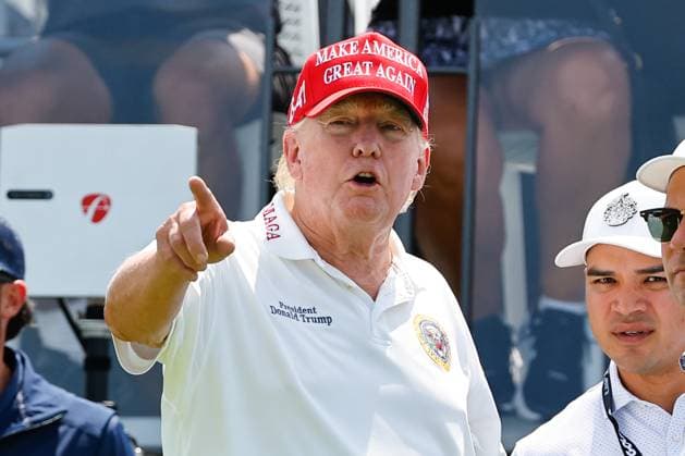 BEDMINSTER, NJ - AUGUST 11: Former President Donald Trump at the 1st tee during LIV Golf Bedminster- round 1 on August 11, 2023 at Trump National Golf Club in Bedminster, New Jersey. (Photo by Rich Graessle Icon Sportswire) GOLF: AUG 11 LIV Golf Bedminster EDITORIAL USE ONLY Icon23081122261