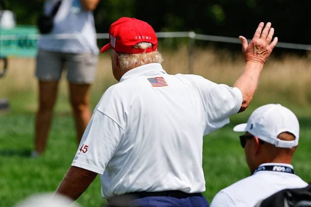 BEDMINSTER, NJ - AUGUST 11: Former President Donald Trump walks off the 1st tee during LIV Golf Bedminster- round 1 on August 11, 2023 at Trump National Golf Club in Bedminster, New Jersey. (Photo by Rich Graessle Icon Sportswire) GOLF: AUG 11 LIV Golf Bedminster EDITORIAL USE ONLY Icon23081122265