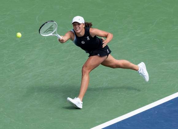 August 12, 2023, MONTREAL, PQ, Canada: Iga Swiatek of Poland, stretches for the ball against Jessica Pegula of the United States, during semifinal action at the National Bank Open tennis tournament in Montreal, Saturday, Aug. 12, 2023. Canada News - August 12, 2023 - ZUMAc35_ 20230812_zaf_c35_002 Copyright: xChristinnexMuschix