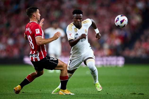 Athletic Bilbao v Real Madrid CF - LaLiga EA Sports Vinicius Junior of Real Madrid Cf (R) battles for the ball with Oscar de Marcos of Athletic Club de Bilbao (L) during the LeLiga EA Sports match between Athletic Bilbao and Real Madrid CF at Estadio de San Mames, in Bilbao, Spain, on August 13, 2023. Bilbao Spain  Copyright: xAlvaroxMedrandax originalFilename:medranda-athletic230812_np1dv.jpg