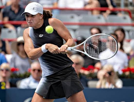 (230813) -- MONTREAL, Aug. 13, 2023 -- Iga Swiatek hits a return during the women s singles semifinal match between Jessica Pegula of the United States and Iga Swiatek of Poland at the National Bank Open tennis tournament in Montreal, Canada, Aug. 12, 2023. (Photo by Xinhua) (SP)CANADA-MONTREAL-TENNIS-NATIONAL BANK OPEN-WOMEN S SINGLES AndrewxSoong 