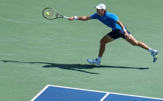 (230813) -- TORONTO, Aug. 13, 2023 -- Alex De Minaur hits a returns during the men s singles semifinal match between Alejandro Davidovich Fokina of Spain and Alex De Minaur of Australia at the 2023 National Bank Open in Toronto, Canada, on Aug. 12, 2023. (Photo by Xinhua) (SP)CANADA-TORONTO-TENNIS-NATIONAL BANK OPEN-MEN S SINGLES ZouxZheng 